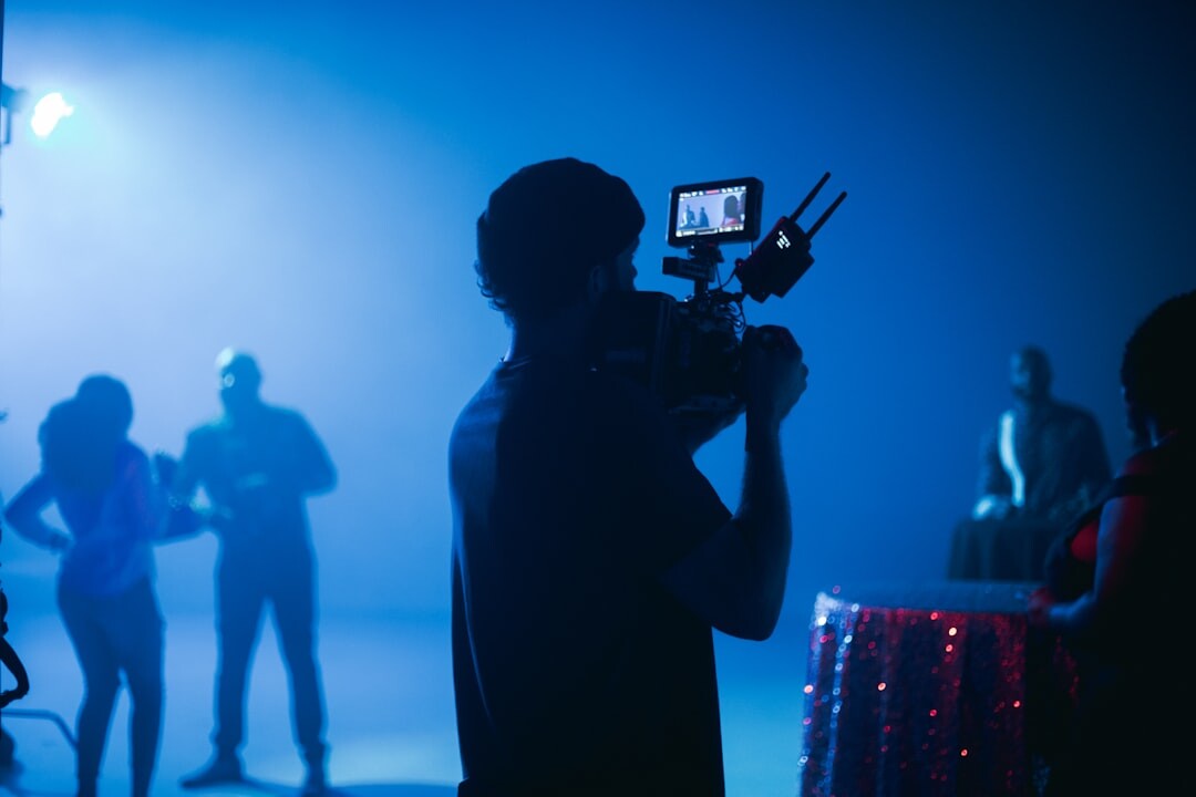 cinematographer filming scene